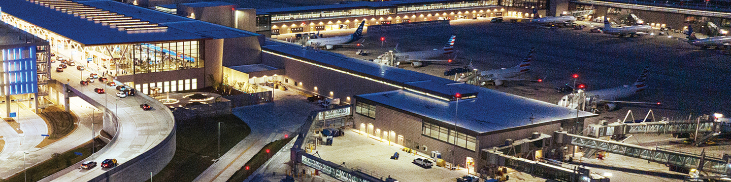 An image of the Kansas City airport terminal with the words "M-C-I Master Plan" written on it